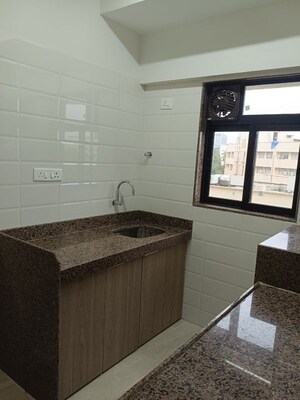 Kitchen in 2 BHK Apartment at Chandiwala Pearl Heaven, Andheri East – for Rent