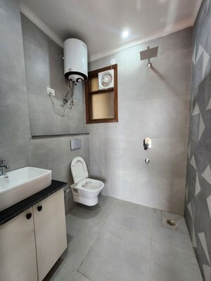 Bathroom in 3 BHK Builder Floor at Freedom Fighters Enclave – for Rent