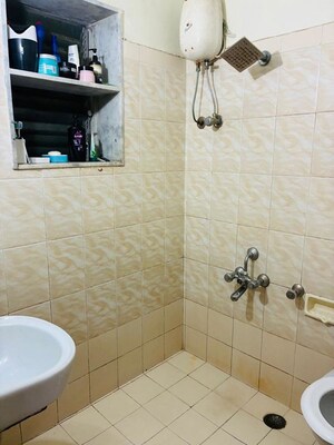 Bathroom in 1 BHK Apartment at Ansal Whispering Meadows, Mulund West – for Rent