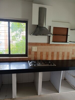 Kitchen in 4 BHK Apartment at Raheja Gardens, Wanwadi – for Sale