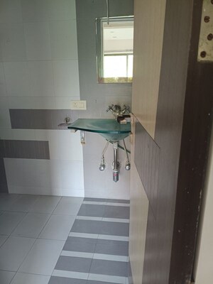 Bathroom in 4 BHK Apartment at Raheja Gardens, Wanwadi – for Sale