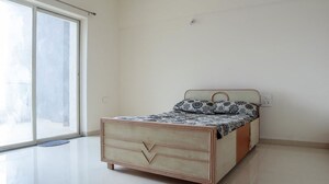 Bedroom in 2 BHK Apartment at Kohinoor Grandeur, Ravet – for Rent