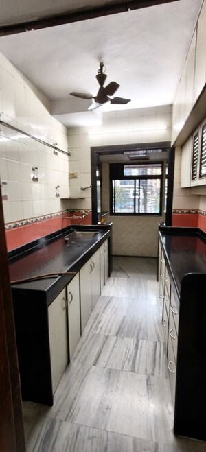 Kitchen in 2 BHK Apartment at Palash Towers, Andheri West – for Rent