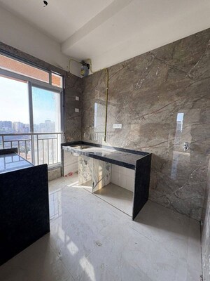 Kitchen in 2 BHK Apartment at DGS Sheetal Ekta, Malad East – for Rent
