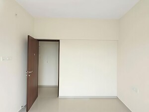 Bedroom in 2 BHK Apartment at Rustomjee Urbania Acura, Thane West – for Rent