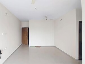 Living Room in 2 BHK Apartment at Rustomjee Urbania Acura, Thane West – for Rent