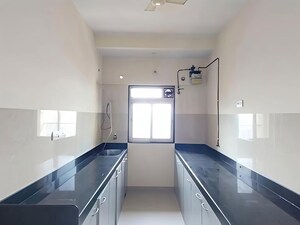 Kitchen in 2 BHK Apartment at Rustomjee Urbania Acura, Thane West – for Rent