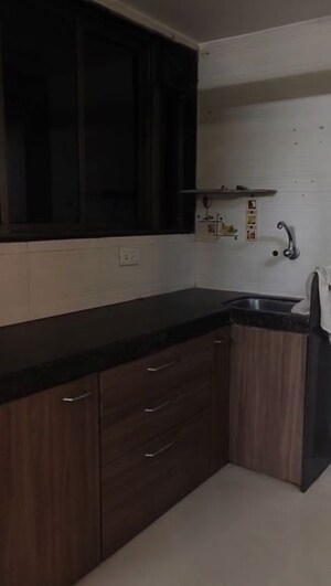 Kitchen in 1.5 BHK Apartment at Landmark Tower, Dadar East – for Rent