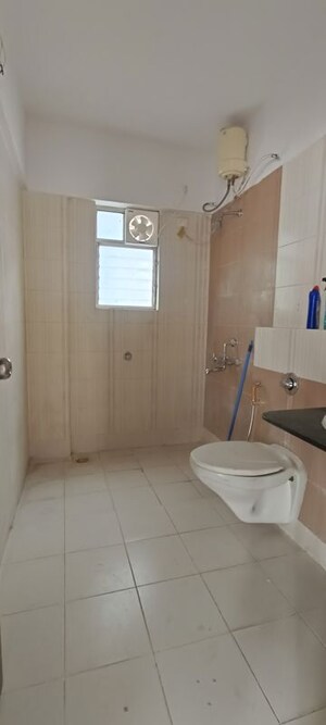 Bathroom in 4 BHK Apartment at Kolte Patil Green Groves, Wagholi – for Sale