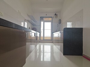 Kitchen in 2 BHK Apartment at Rustomjee Urbania Azziano, Thane West – for Rent