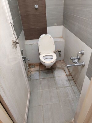 Bathroom in 2 BHK Apartment at Prahlad Nagar – for Sale