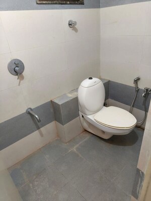 Bathroom in 2 BHK Apartment at Prahlad Nagar – for Sale