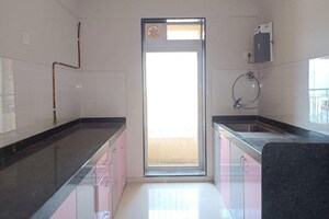 Kitchen in 2 BHK Apartment at Rustomjee Azziano Wing K, Thane West – for Sale