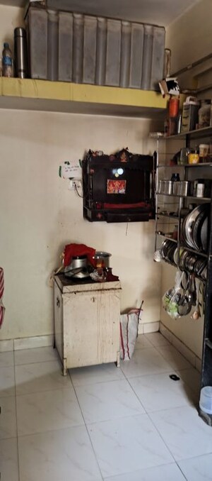 Kitchen in 2 BHK Apartment at Snehal Park CHS, Badlapur West – for Sale
