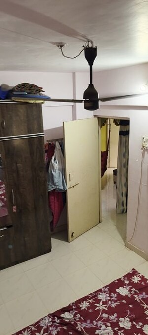 Bedroom in 2 BHK Apartment at Snehal Park CHS, Badlapur West – for Sale