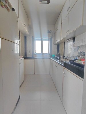 Kitchen in 2 BHK Apartment at V V A Vision Avarsekar Heights, Worli – for Rent