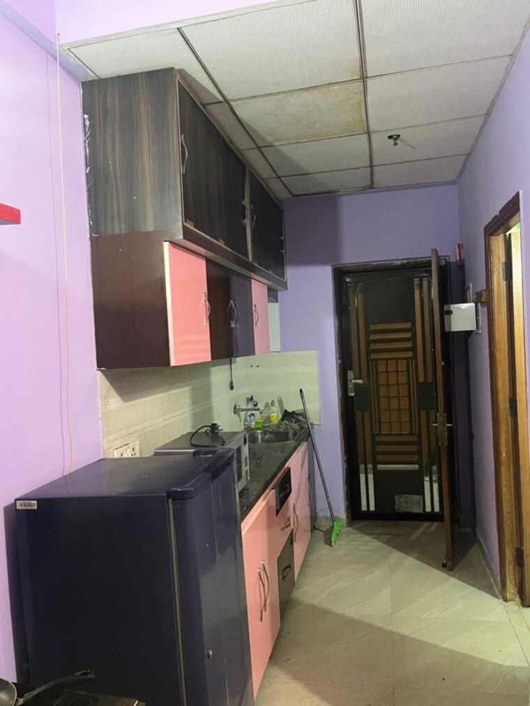 Kitchen, designarch-e-studios Studio 550 Sq.Ft. Apartment In Upsidc Site C Greater Noida 10522814