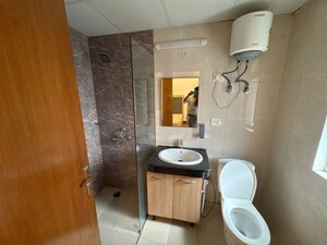 Bathroom in 1 BHK Apartment at Nimbus The Golden Palm, Sector 168 – for Sale