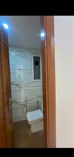 Bathroom in 4 BHK Builder Floor at Mahavir Enclave – for Sale