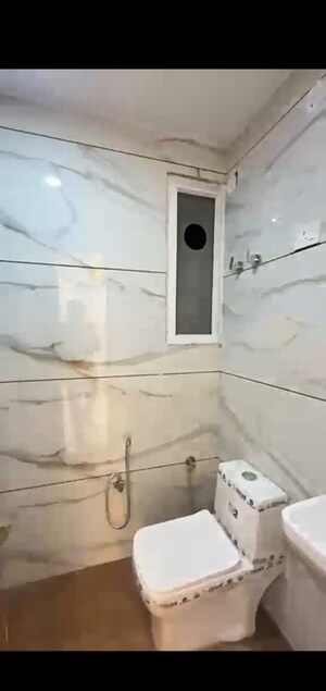 Bathroom in 4 BHK Builder Floor at Mahavir Enclave – for Sale