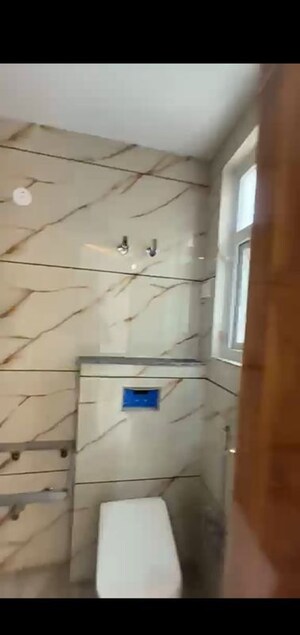 Bathroom in 4 BHK Builder Floor at Mahavir Enclave – for Sale