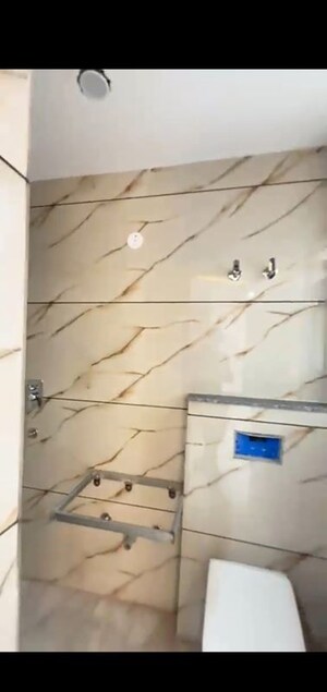 Bathroom in 4 BHK Builder Floor at Mahavir Enclave – for Sale