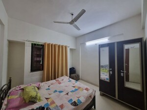 Bedroom in 1 BHK Apartment at Kumar Paradise Pune, Magarpatta City – for Rent