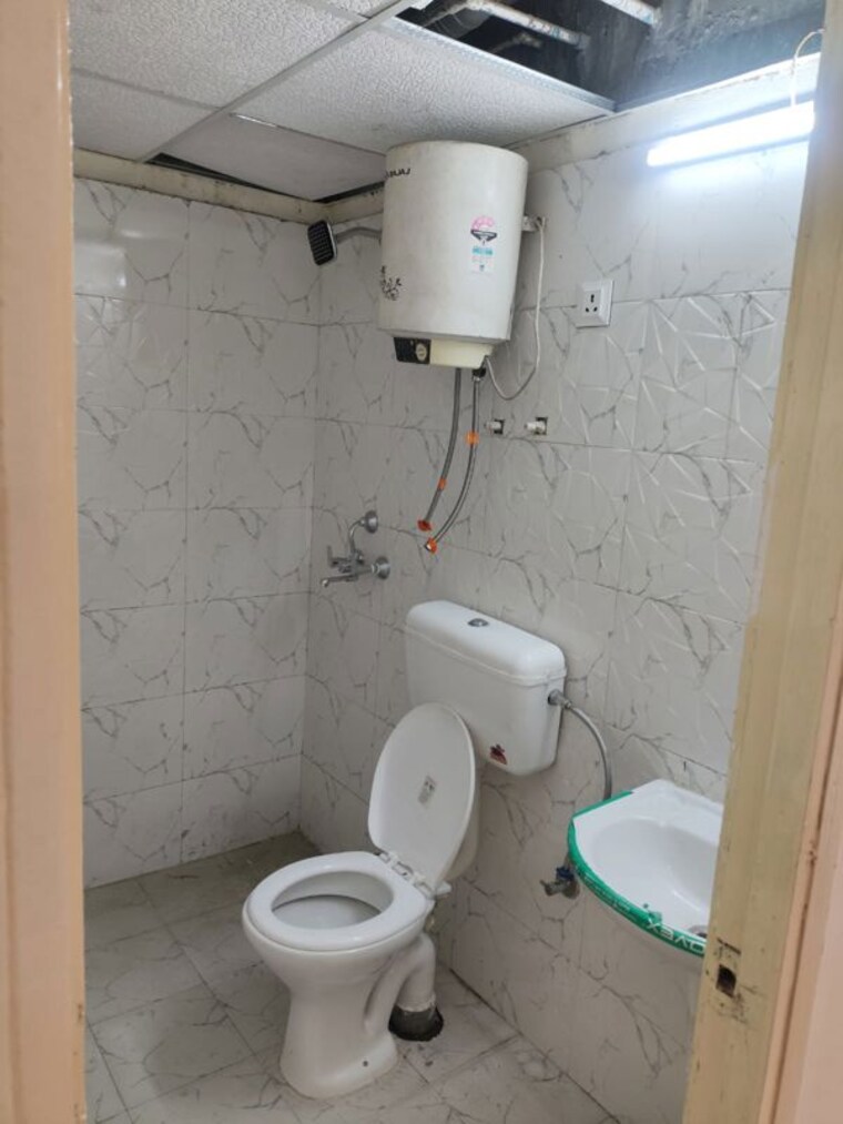 Bathroom, mrg-ultimus 2 Bedroom 585 Sq.Ft. Apartment In Sector 90 Gurgaon 10523268