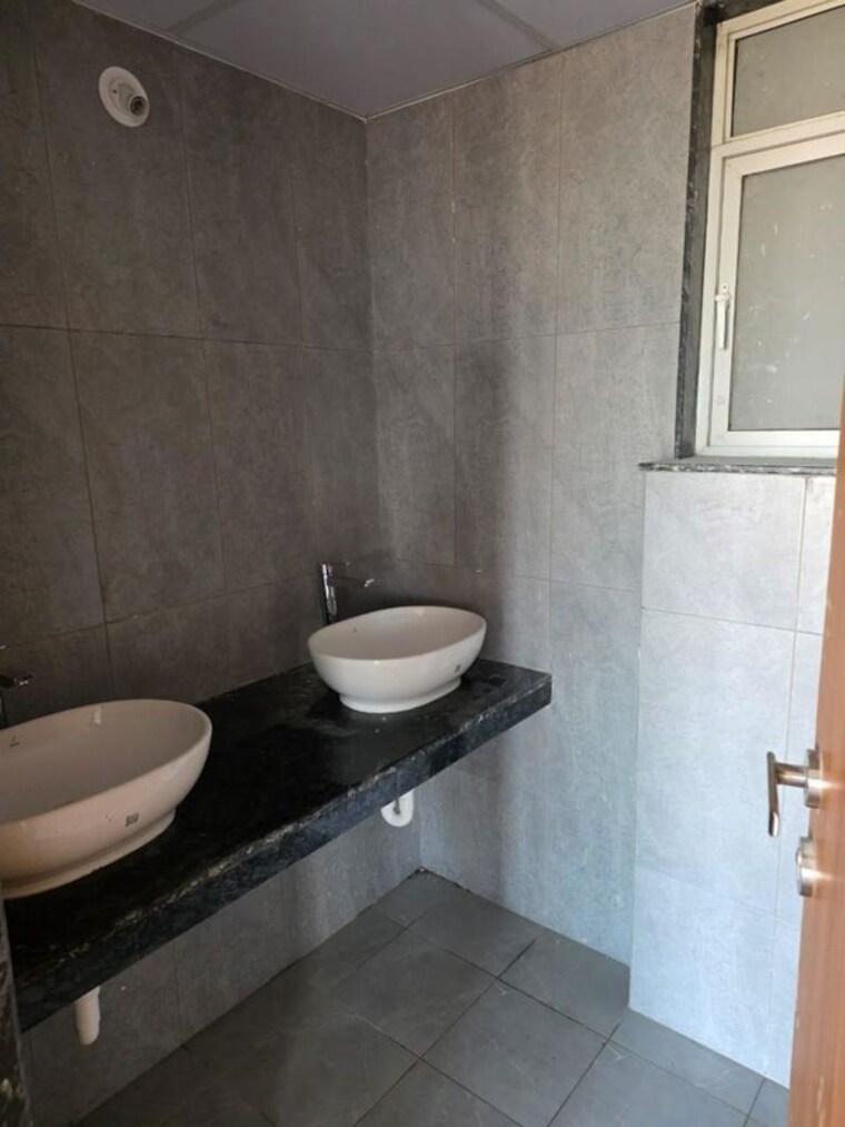Bathroom, gera-planet-of-joy 2 Bedroom 800 Sq.Ft. Apartment In Kharadi Pune 10523540