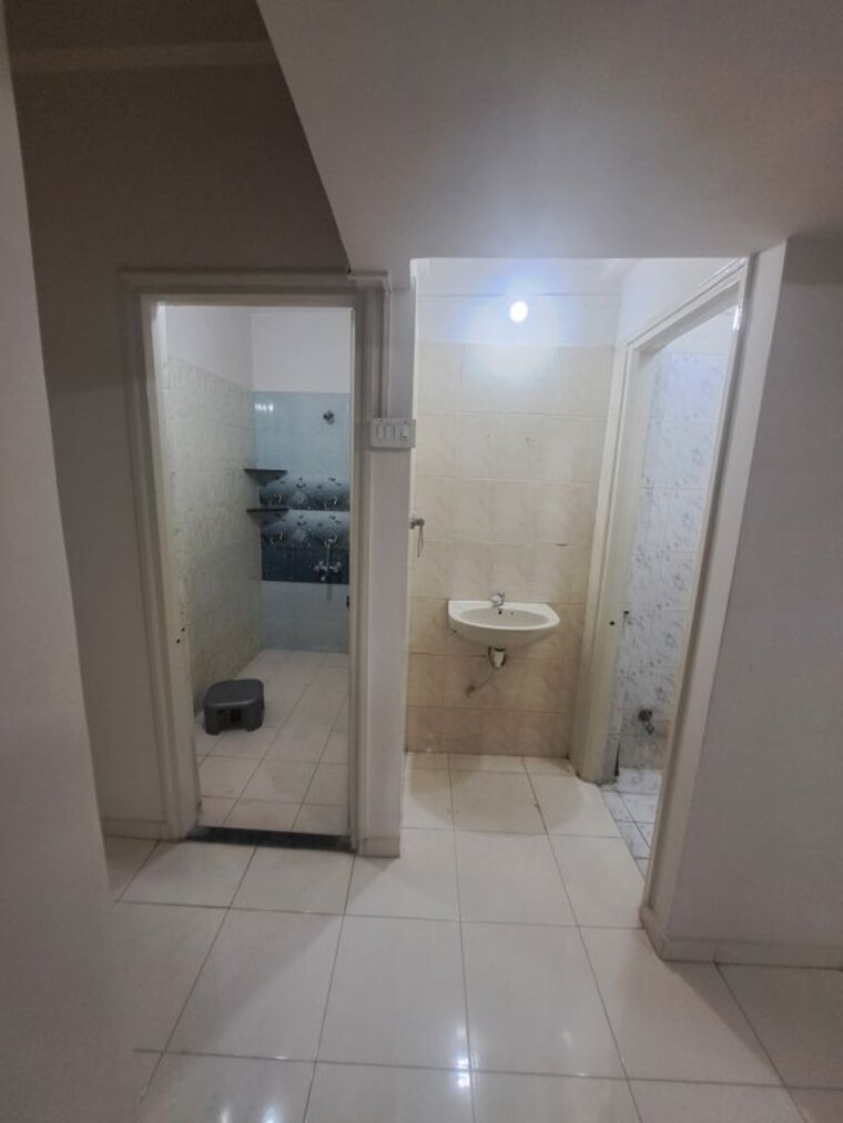 Bathroom, wakad 2 Bedroom 900 Sq.Ft. Apartment In Wakad Pune 10523691