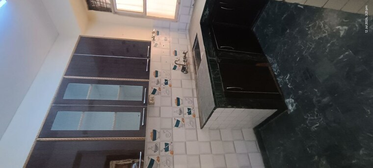 Kitchen, eros-southend-apartments 2 Bedroom 827 Sq.Ft. Apartment In Charmwood Village Faridabad 10523981