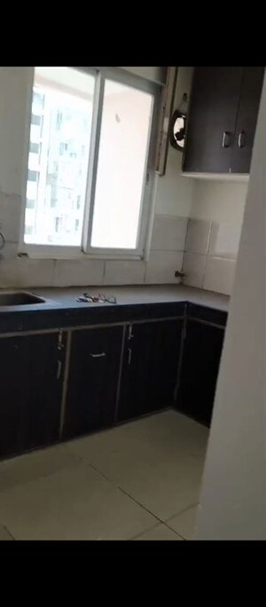 Kitchen in 2 BHK Apartment at Ajnara Le Garden, Sector 16b Greater Noida – for Rent