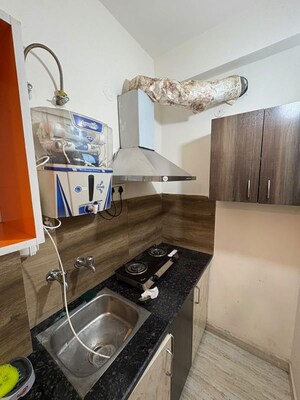 Kitchen in Studio Builder Floor at Sector 45 – for Rent