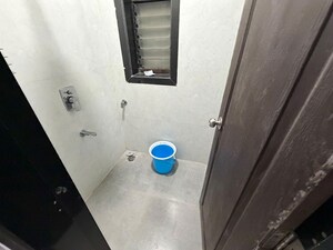 Bathroom in 1 BHK Apartment at Champak Apartment 59, Vasant Vihar – for Rent