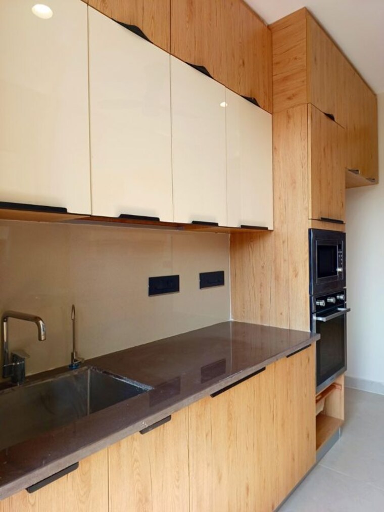 Kitchen, the-ananta-aspire 3 Bedroom 1843 Sq.Ft. Apartment In Utrathiya Zirakpur 10524196