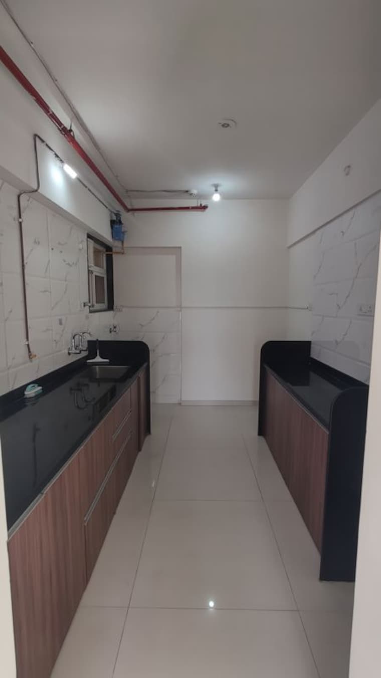 Kitchen, sukhwani-skylines 2 Bedroom 954 Sq.Ft. Apartment In Wakad Pune 10524236
