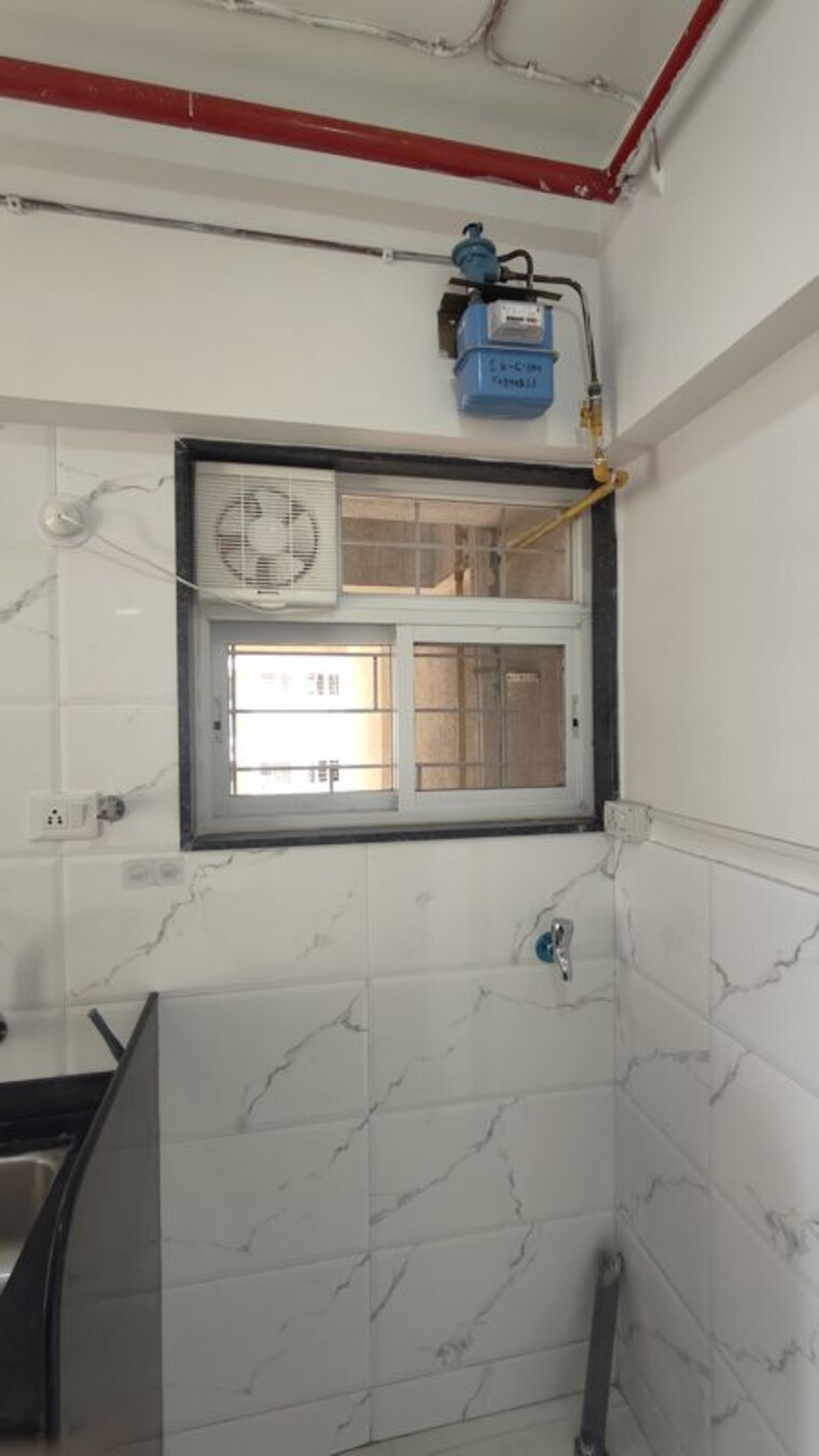 Kitchen, sukhwani-skylines 2 Bedroom 954 Sq.Ft. Apartment In Wakad Pune 10524236