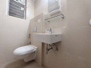 Bathroom in 3 BHK Apartment at Godrej Emerald, Ghodbunder Road – for Rent