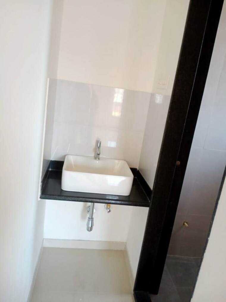 Bathroom, tathawade 1 Bedroom 600 Sq.Ft. Apartment In Tathawade Pune 10524308