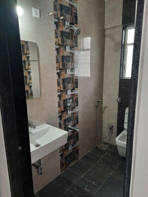 Bathroom in 2 BHK Apartment at Dahanukar Colony – for Sale