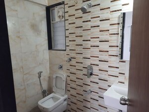 Bathroom in 2 BHK Apartment at Dahanukar Colony – for Sale