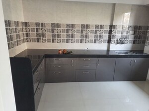 Kitchen in 2 BHK Apartment at Dahanukar Colony – for Sale