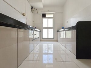 Kitchen in 3 BHK Apartment at Godrej Emerald, Ghodbunder Road – for Rent