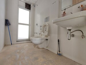 Bathroom in 3 BHK Apartment at Godrej Emerald, Ghodbunder Road – for Rent