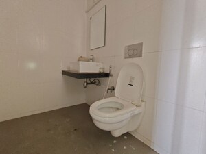 Bathroom in 3 BHK Apartment at Godrej Emerald, Ghodbunder Road – for Rent