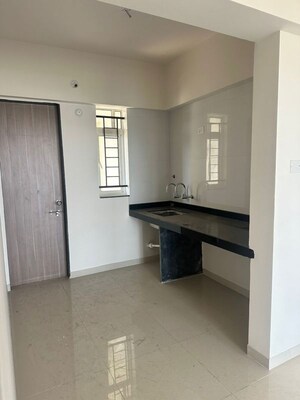 Kitchen in 2 BHK Apartment at Kolte Patil Little Earth, Kiwale – for Rent
