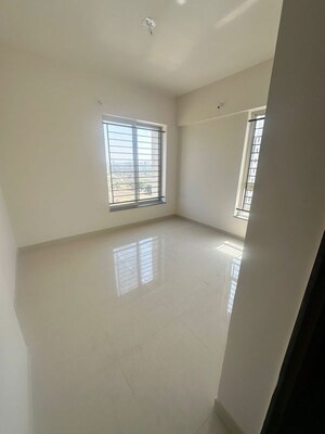 Room in 2 BHK Apartment at Kolte Patil Little Earth, Kiwale – for Rent