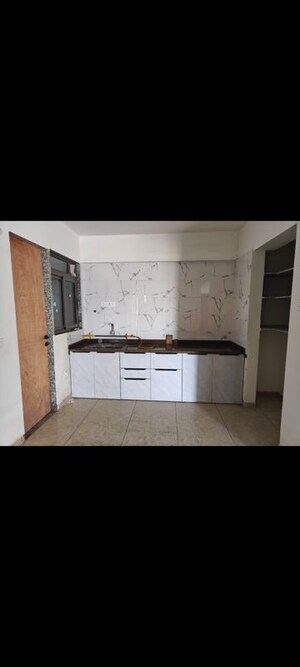 Kitchen in 3 BHK Apartment at Kadamb Pushp, Zundal – for Rent