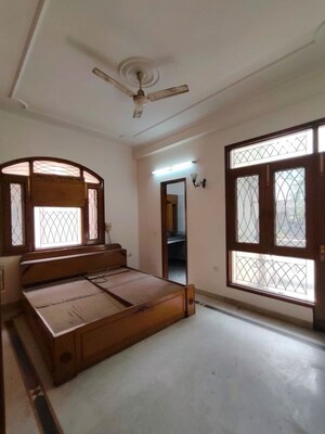 Bedroom in 3 BHK Builder Floor at Nehru Enclave – for Rent