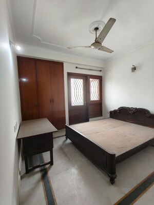 Bedroom in 3 BHK Builder Floor at Nehru Enclave – for Rent